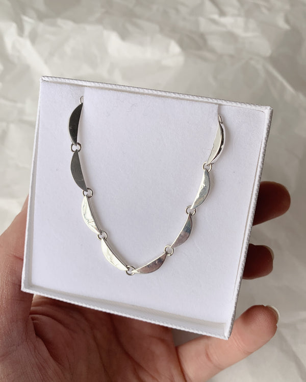 Crescent link necklace