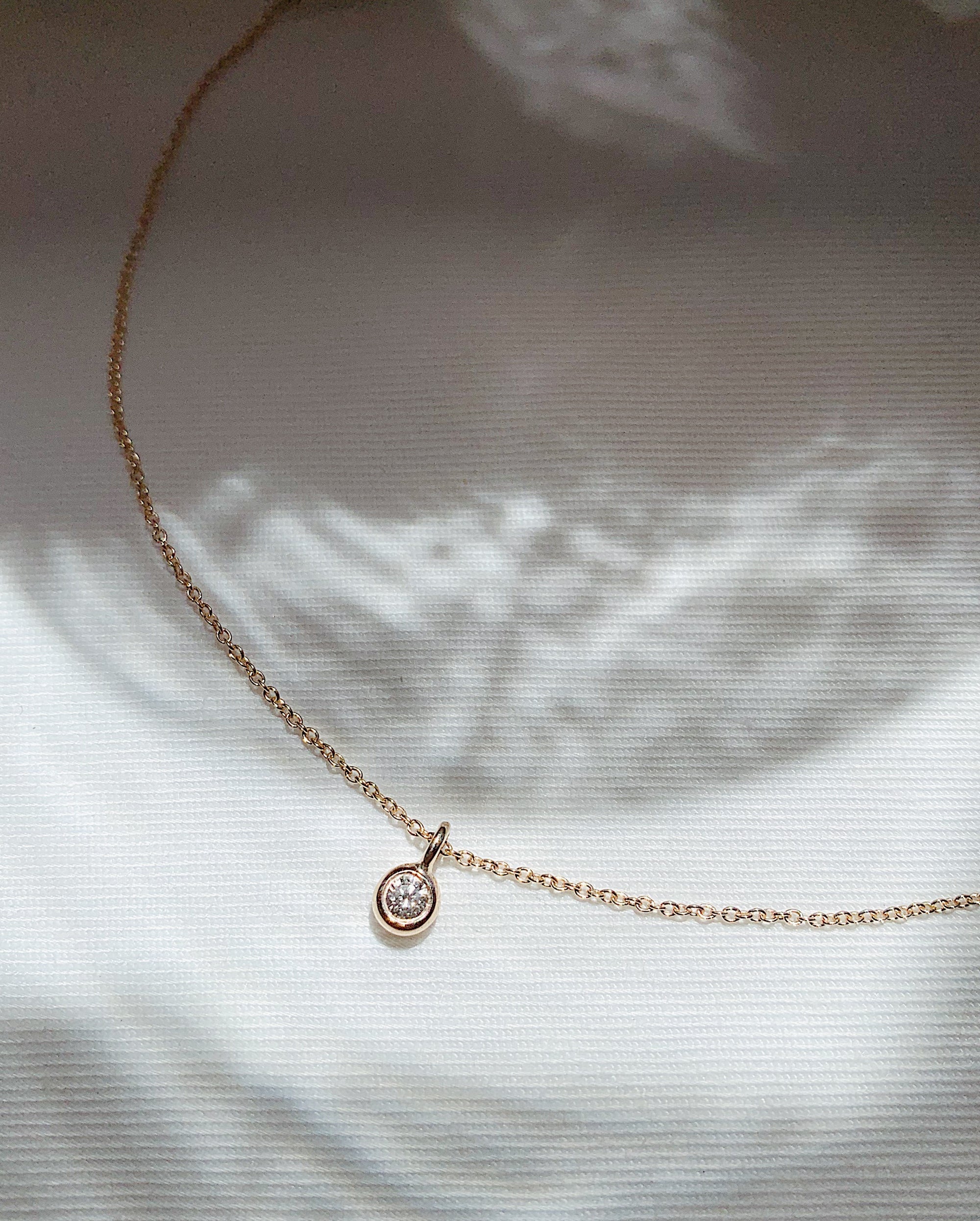 Sigil diamond pendant in 9ct yellow gold